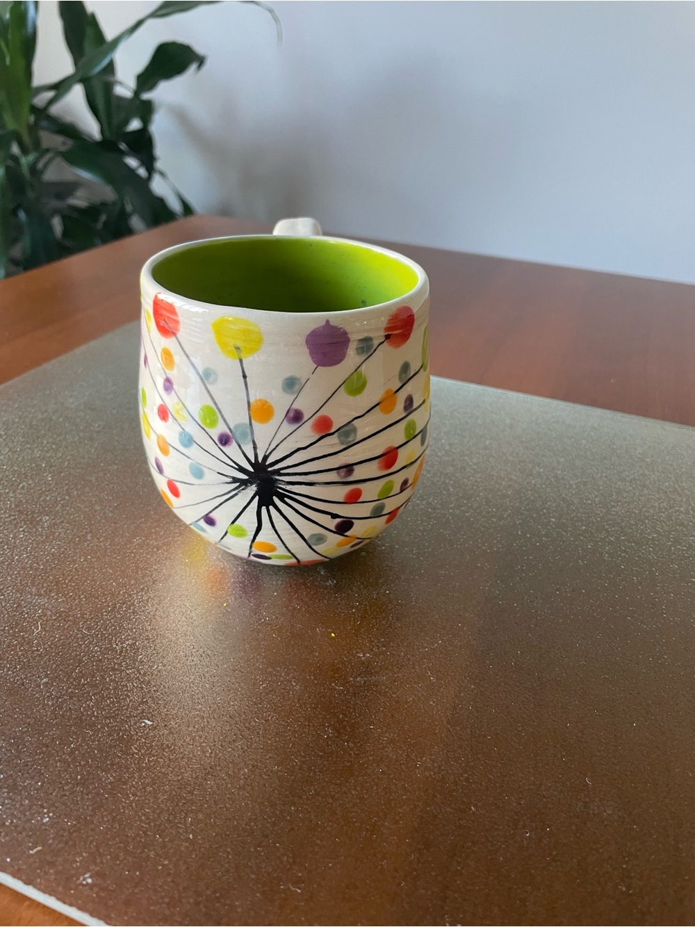 Hand-Painted Ceramic Mug with Bright Green Interior and Multicolor Dot Burst